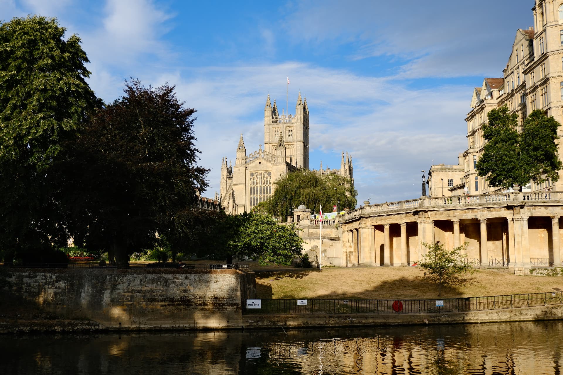 Bath Abbey and Parade Gardens seen from across the river